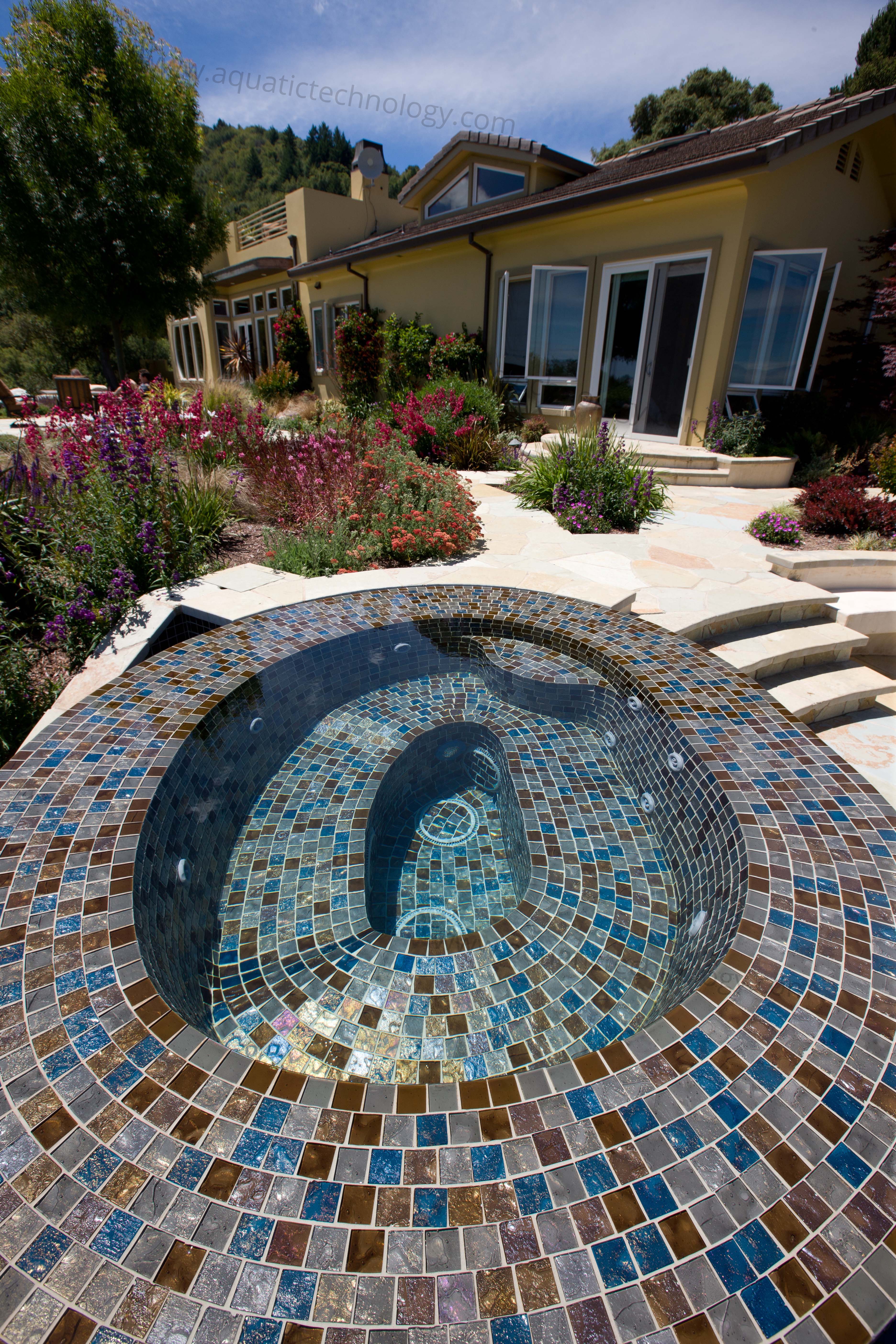 Flooded edge glass tile spa